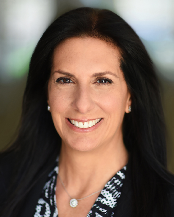 Dina Colombo, a member of the Board of Directors for 1-800-FLOWERS.COM, Inc
