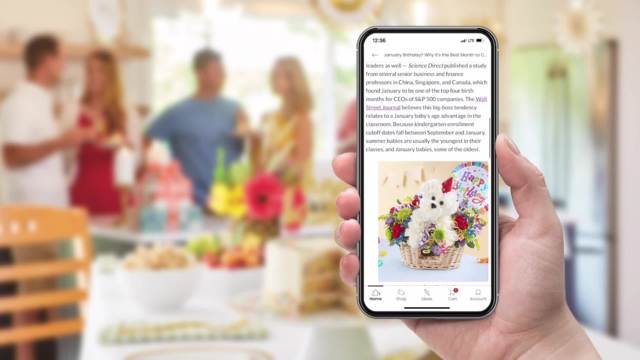 A hand holding a smartphone with the Celebrations Passport Mobile App Experience on its screen