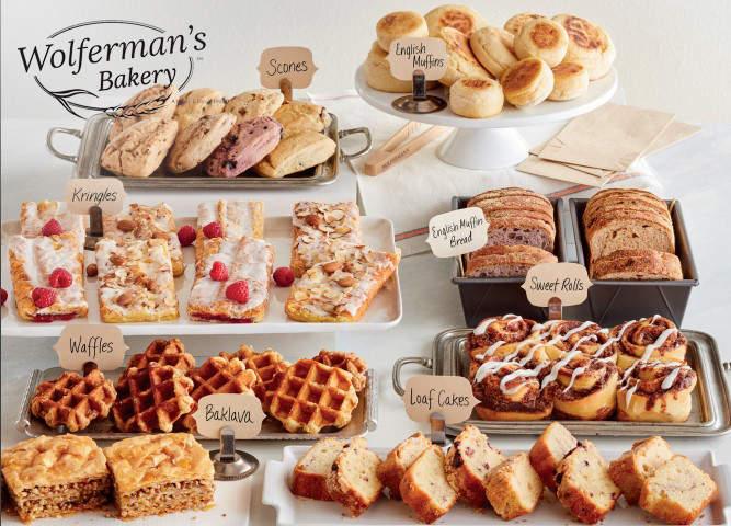 A Wolferman's Bakery Display with gourmet baked goods set on trays 