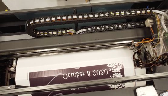 A printing machine at PersonalizationMall.com printing an order that will be transfered onto a product