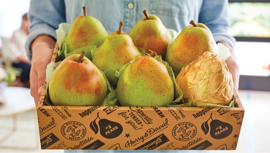A box of seven large pears, with one in gold wrapping, from Harry & David