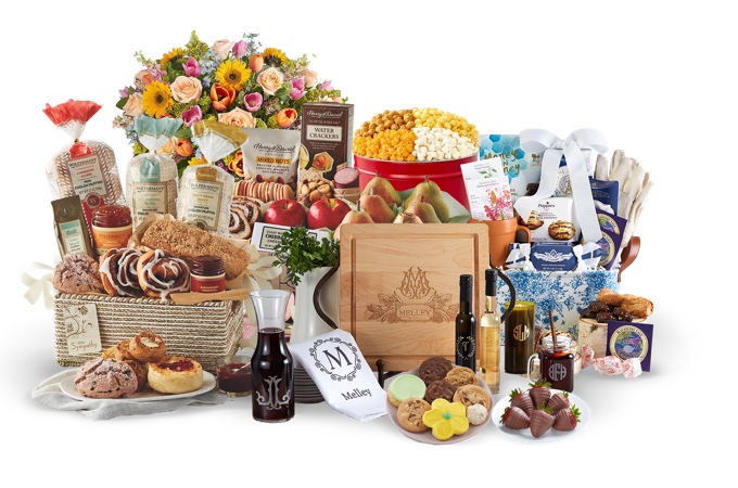 A large display of gourmet foods, gift baskets, floral products, and personalized keepsake items from the 1-800-Flowers.com's family of brands